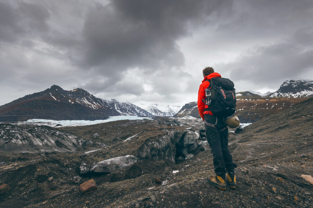 hiking-adventure-travel-man-watching-glacier-iceland